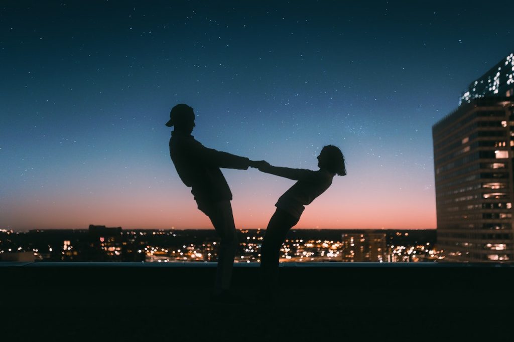 silhoutte of couple dancing